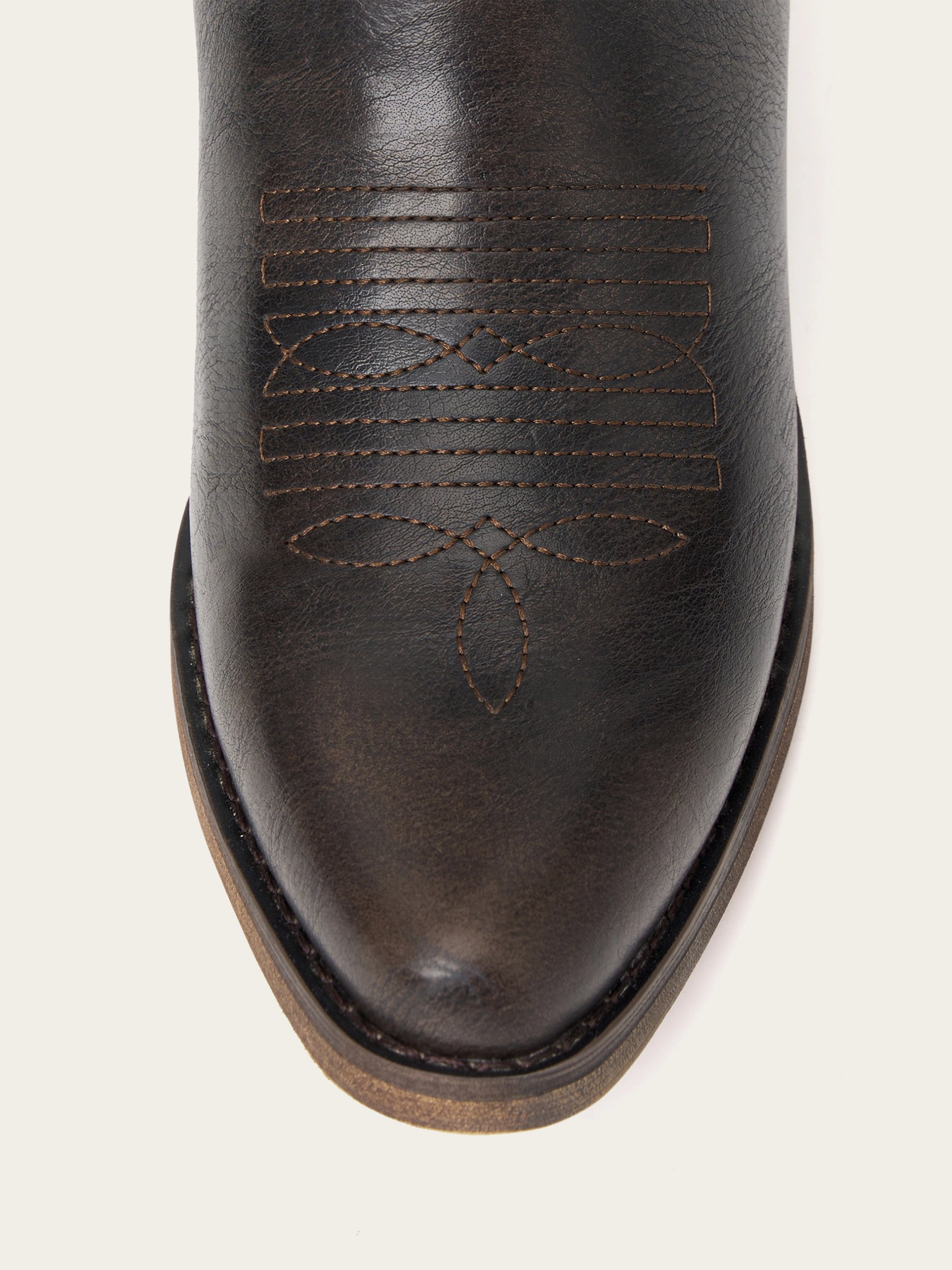 The Legacy: Distressed Black Knee-High Western Boots with a Snip Toe