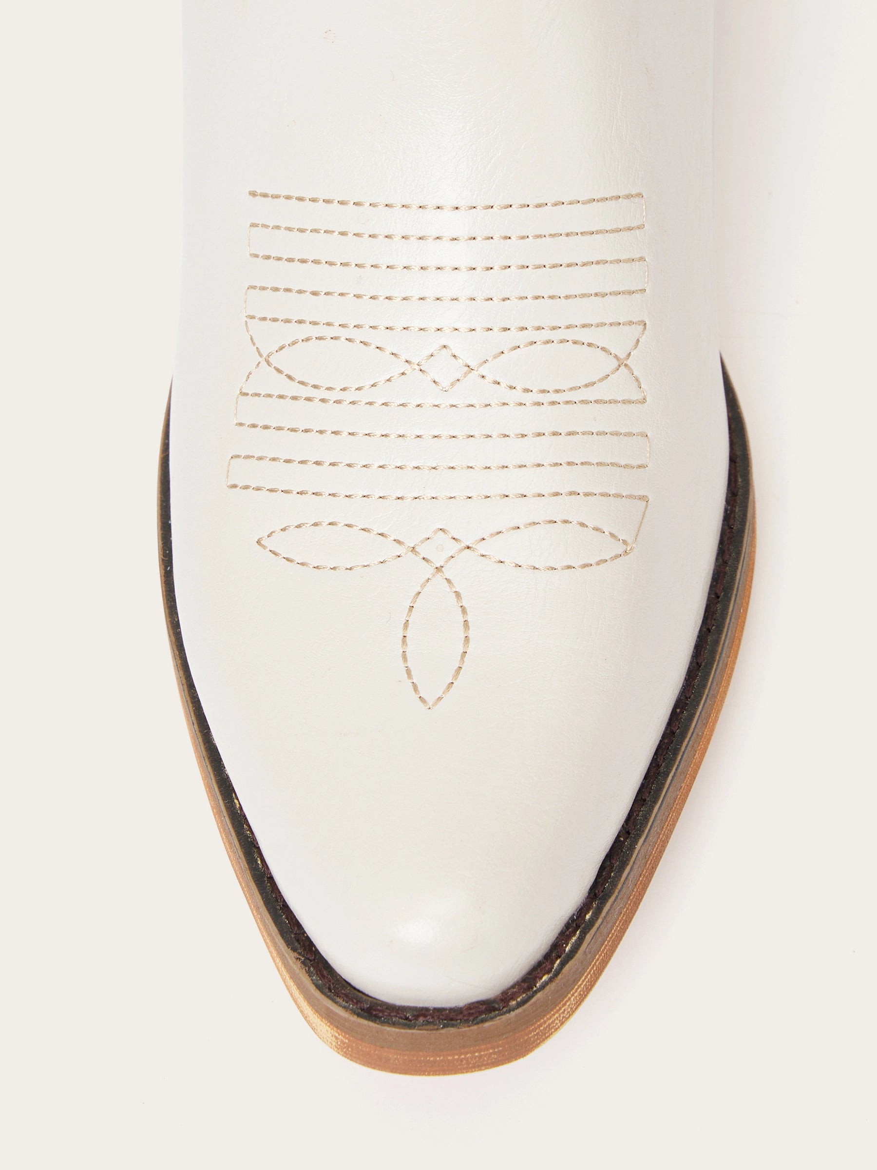 The Legacy: Modern White Knee-High Boots with a Snip Toe